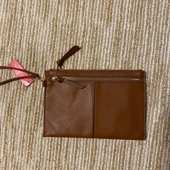 Brown wristlet with zipper details. - Picture 1 of 5